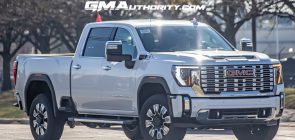 A 2024 GMC Sierra HD Denali in White Frost Tricoat paint.