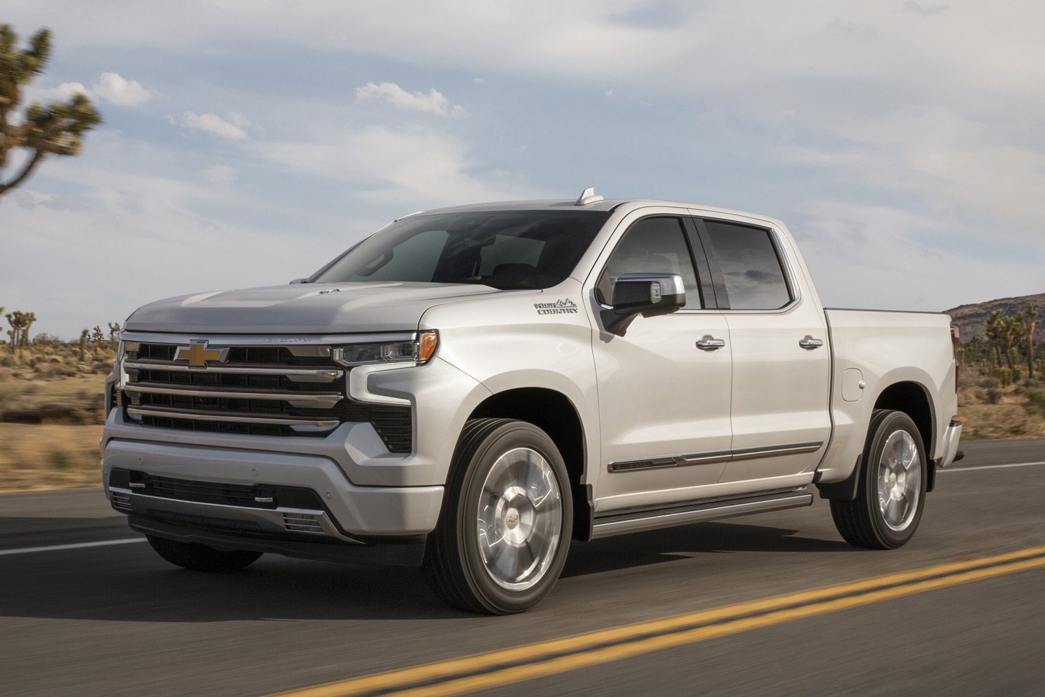 2024 Chevy Silverado High Country Now Available With Midnight Edition   2022 Chevrolet Silverado 1500 High Country Iridescent Pearl Tricoat G1W Press Photos Exterior 005 Side Front Three Quarters 