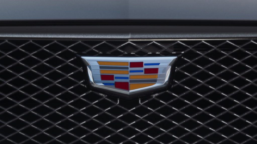 The grille badge of the 2024 Cadillac XT4.