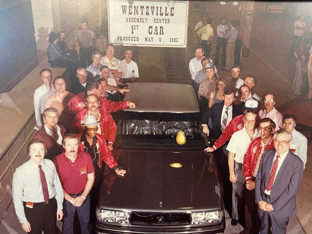 Gary Cowger at the Wentzville, Missouri plant in 1983 with a Buick Electra.