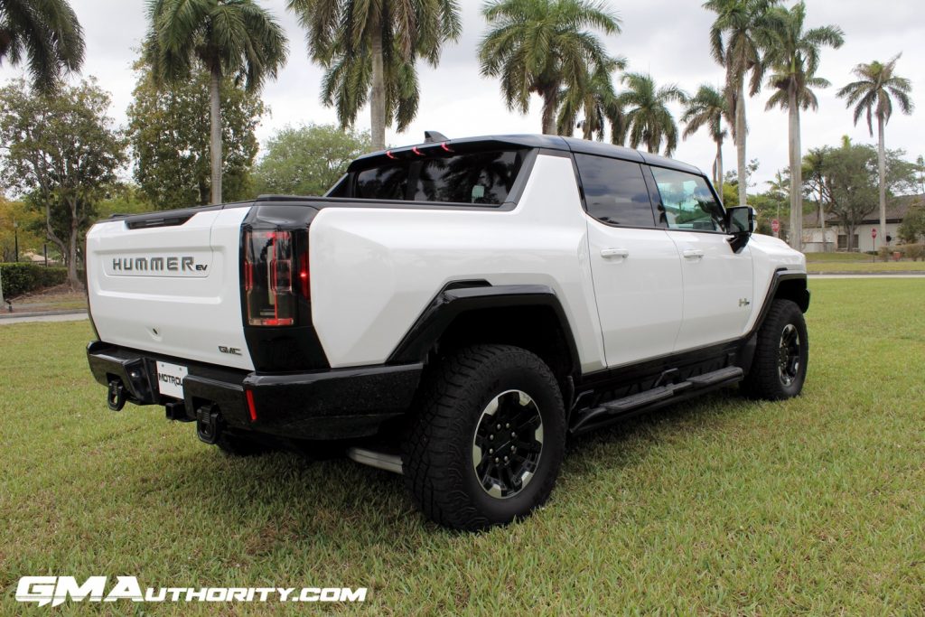The rear three quarters view of the 2022 GMC Hummer EV Pickup.