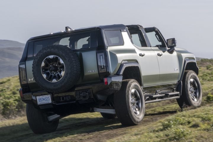 Rear three quarters view of the GMC Hummer EV SUV.