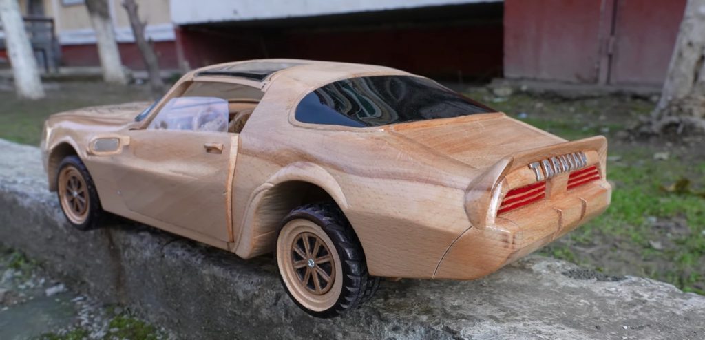 Wood carving of the second-generation Pontiac Firebird Trans Am.