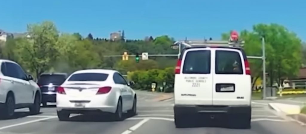 Screenshot of a Buick Regal and GMC Savana crash video.