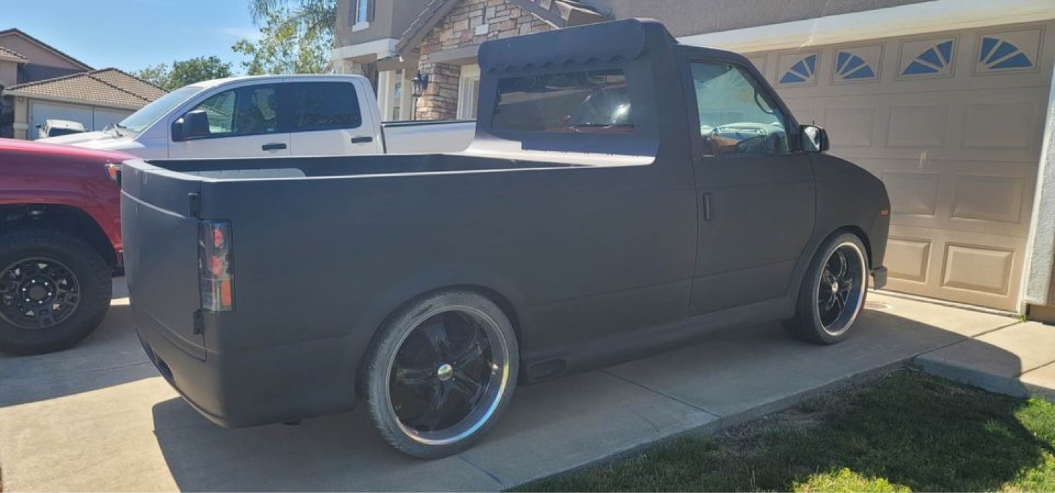 Bizarre Chevy Astro Van Customized With Camaro Front End