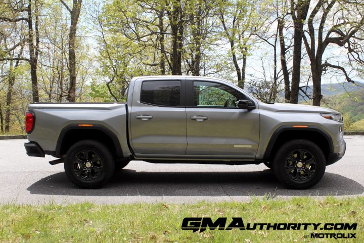 Side view of the 2025 GMC Canyon in Sterling Metallic.