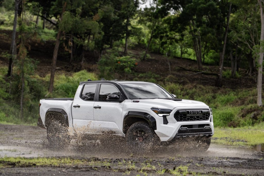 The all-new 2024 Toyota Tacoma hits a mud puddle.