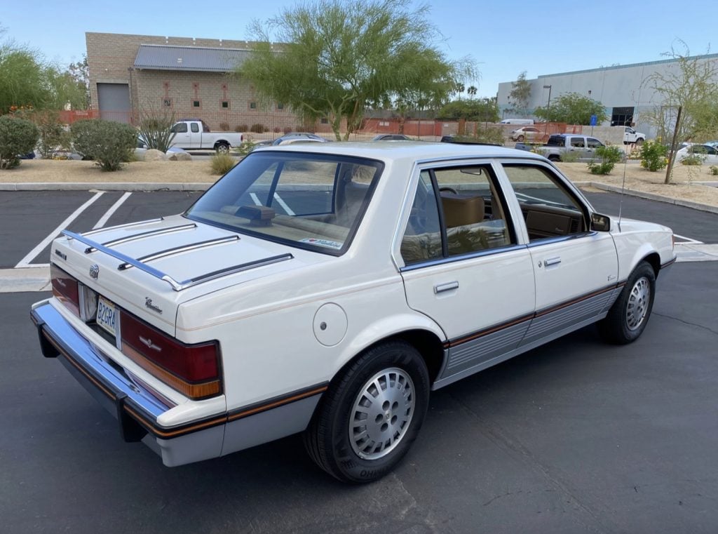 Rear-three-quarter photo of 1986 Cadillac Cimarron.