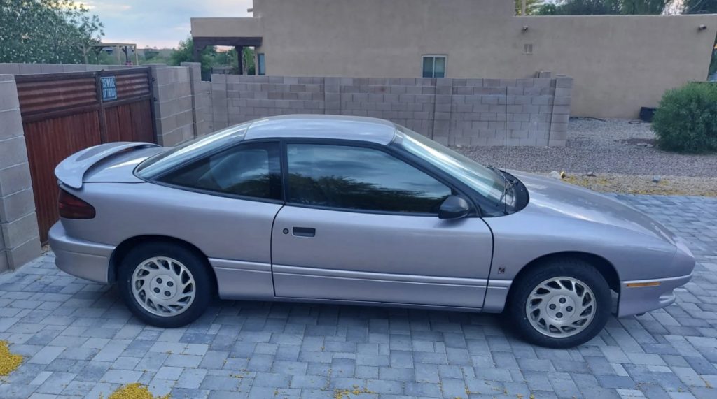 Side profile of 1995 Saturn SC1 Coupe.