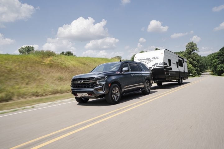 Chevy Suburban Z71 towing a camper.