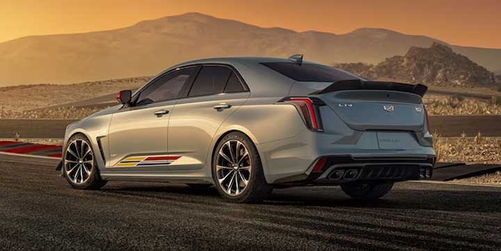 Rear three quarters view of the 2024 Cadillac CT4-V Blackwing Arrival Edition with Mondrian Edition CT4-V Blackwing interior colors.