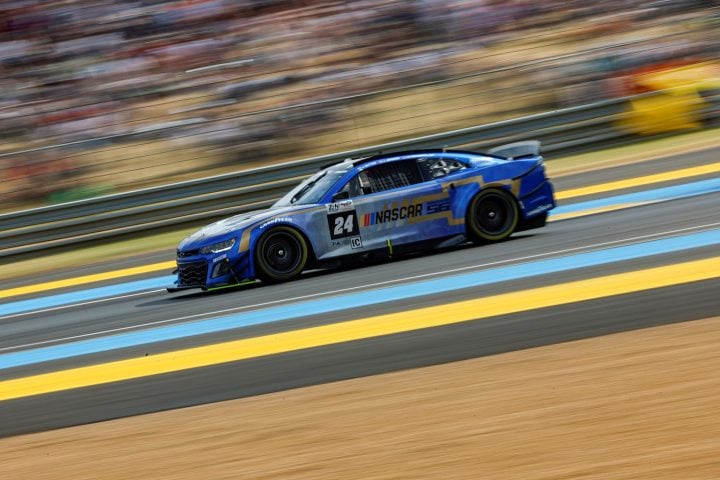 A NASCAR Chevy Camaro races at Le Mans.