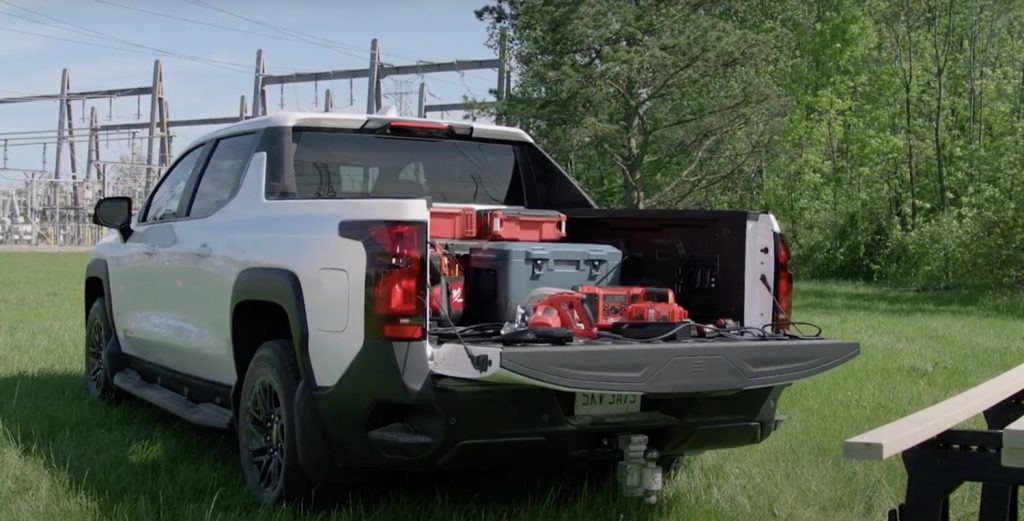 Rear-three-quarter photo of 2024 Chevy Silverado EV.