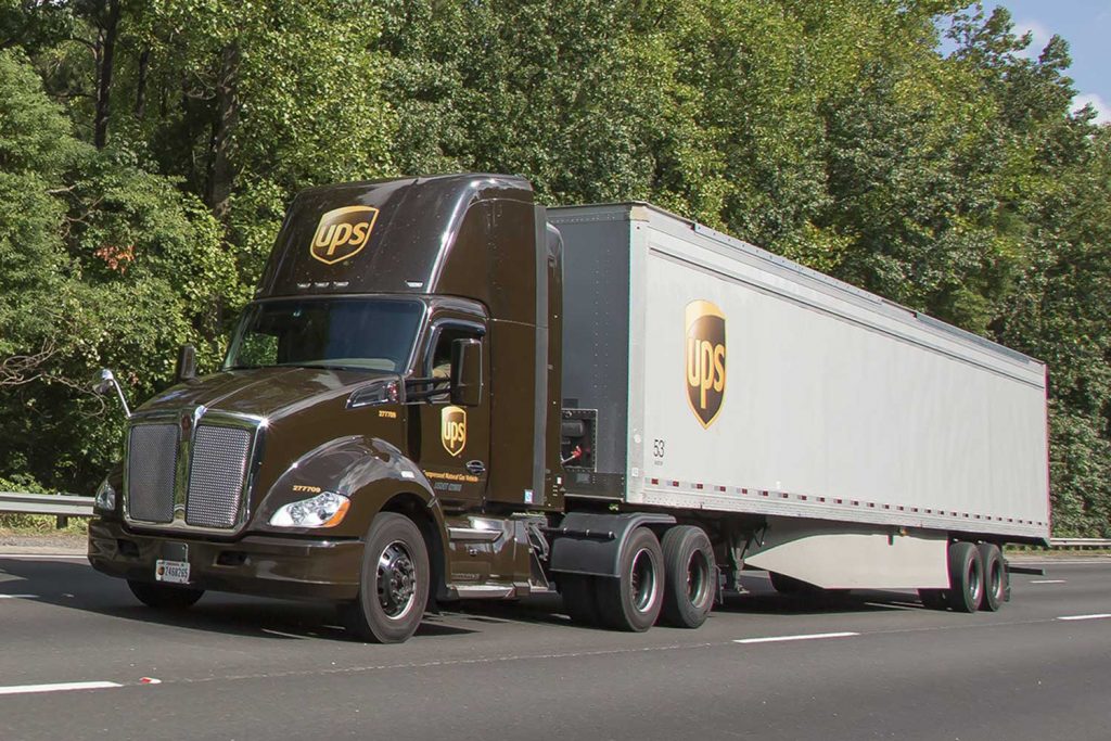 Front three quarters view of an UPS semi. 