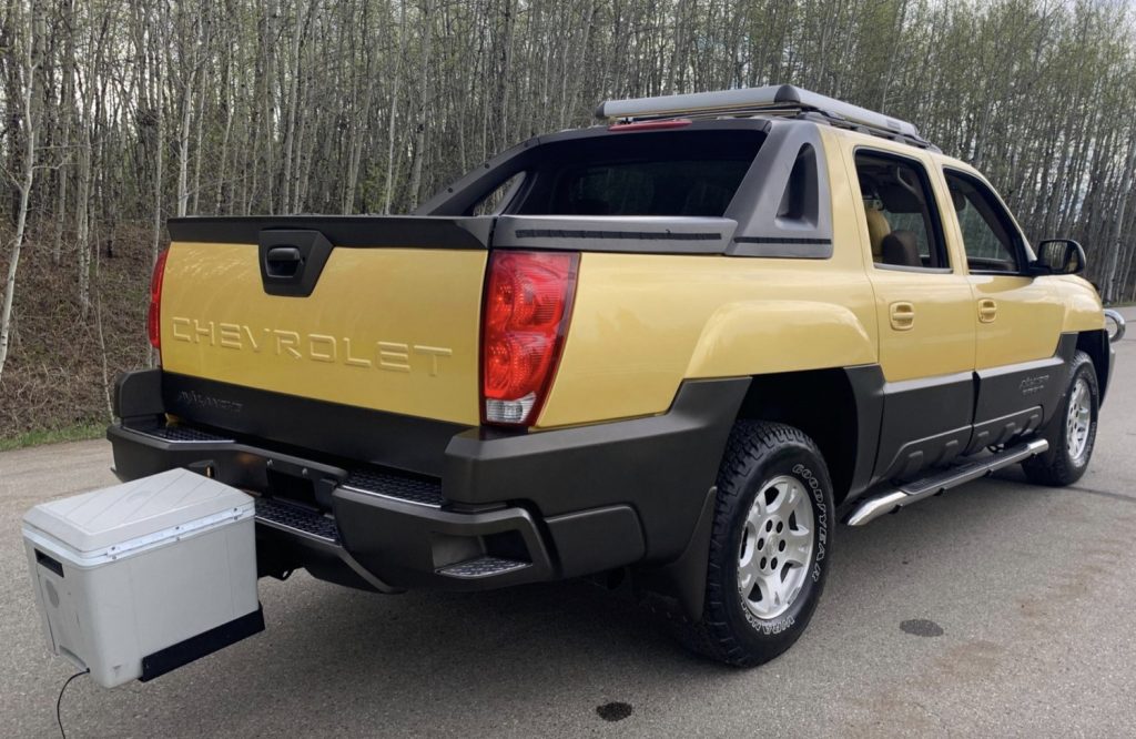 Rear-three-quarter photo of 2002 Chevy Avalanche Base Camp Concept.