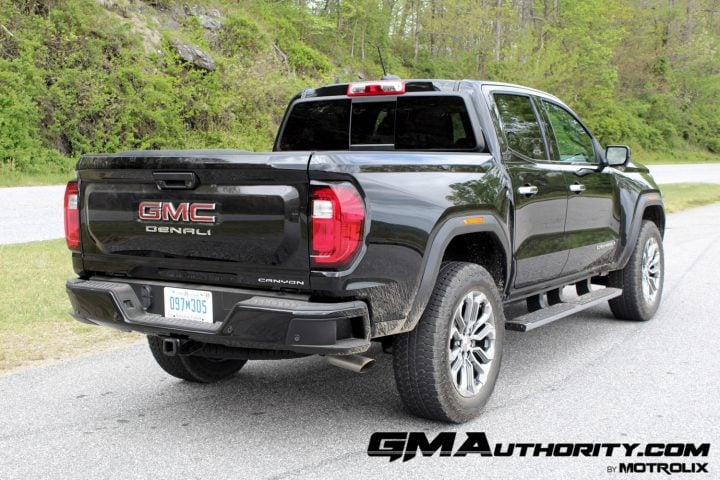 2023 GMC Canyon Denali rear three quarter angle.