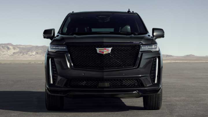 A front end photo of the 2024 Cadillac Escalade-V 20th Anniversary Edition in Black Diamond Tricoat.