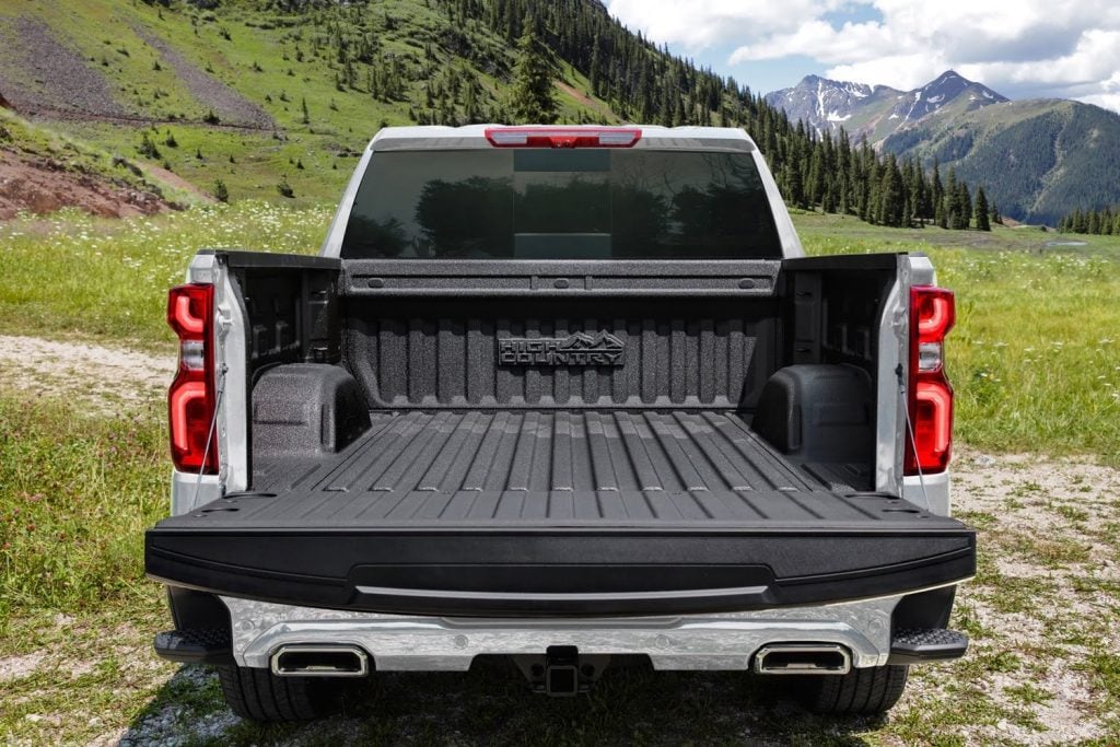 2024 Chevy Silverado Features Largest Bed In Class In Brazil   2024 Chevrolet Silverado 1500 High Country Brazil Press Photos Exterior 010 Bed Cargo Box Tailgate High Country Logo On Bulkhead 1024x683 