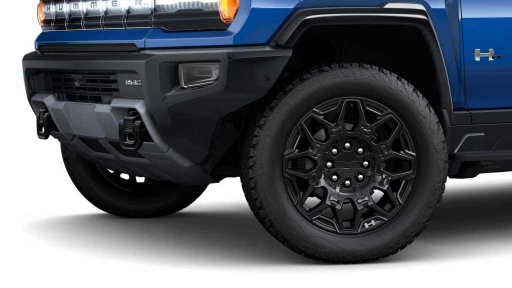 The 2024 GMC Hummer EV Pickup's 22-inch Gloss Black Painted Aluminum wheels (PHY).