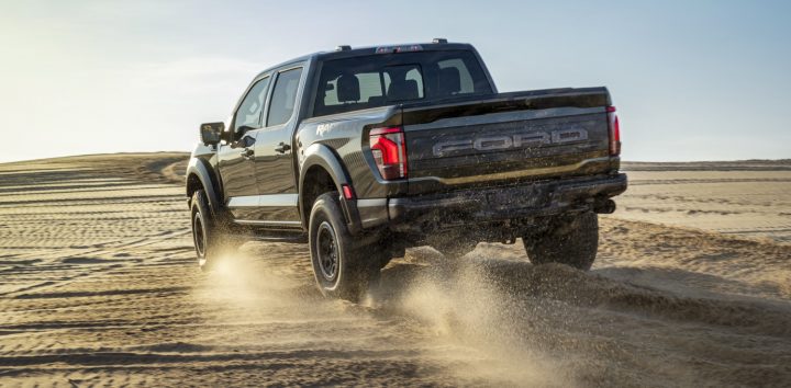 Ford F-150 Raptor driving off road.