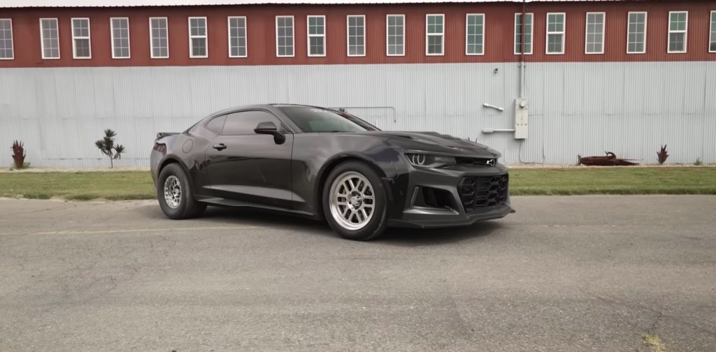 Supercharged Chevy Camaro gets ready for a drag race.