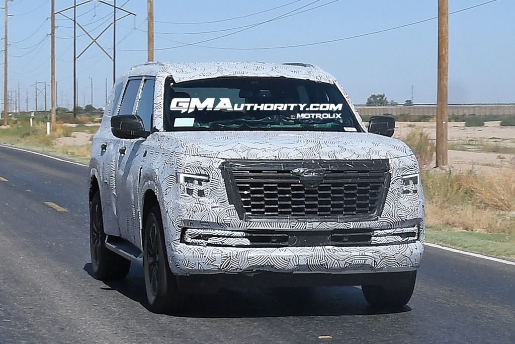 The front end of the next-gen 2025 Nissan Armada, testing as a camouflaged prototype.