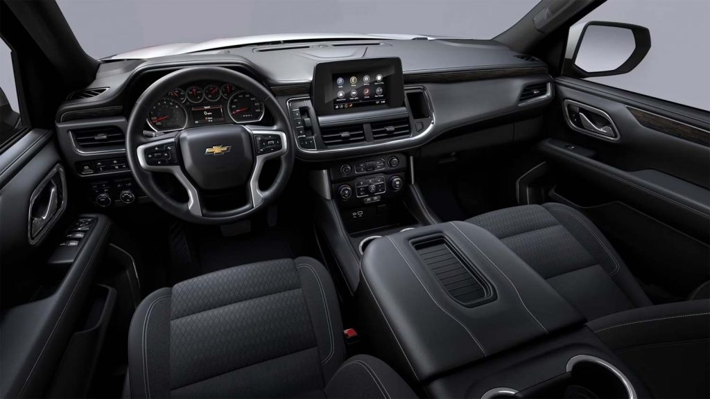 Cockpit view showing 2024 Chevy Tahoe interior colors.