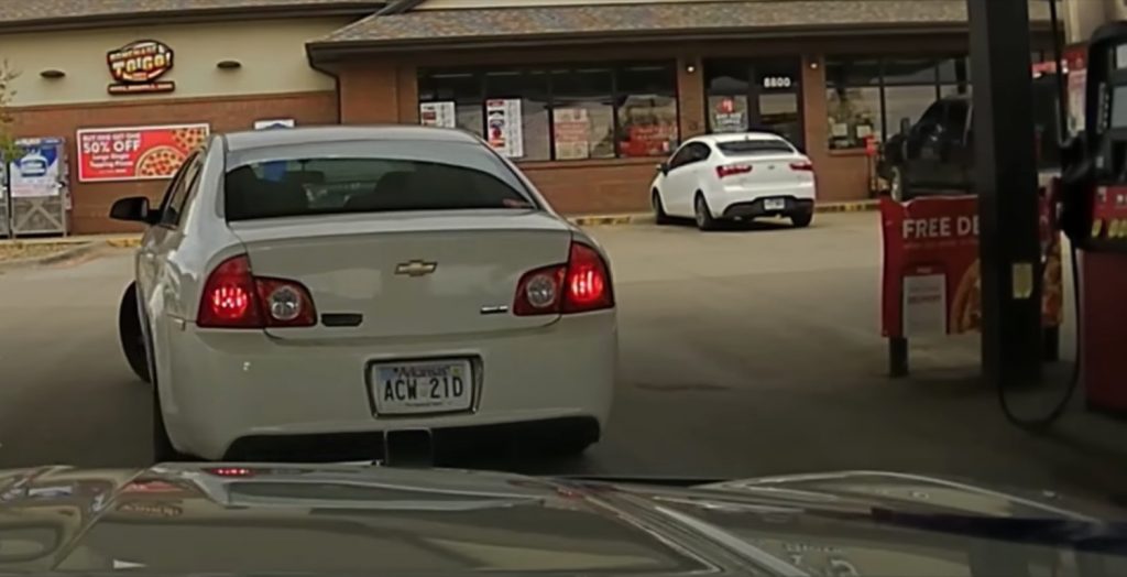 Screenshot from a police chase video involving a Chevy Malibu.
