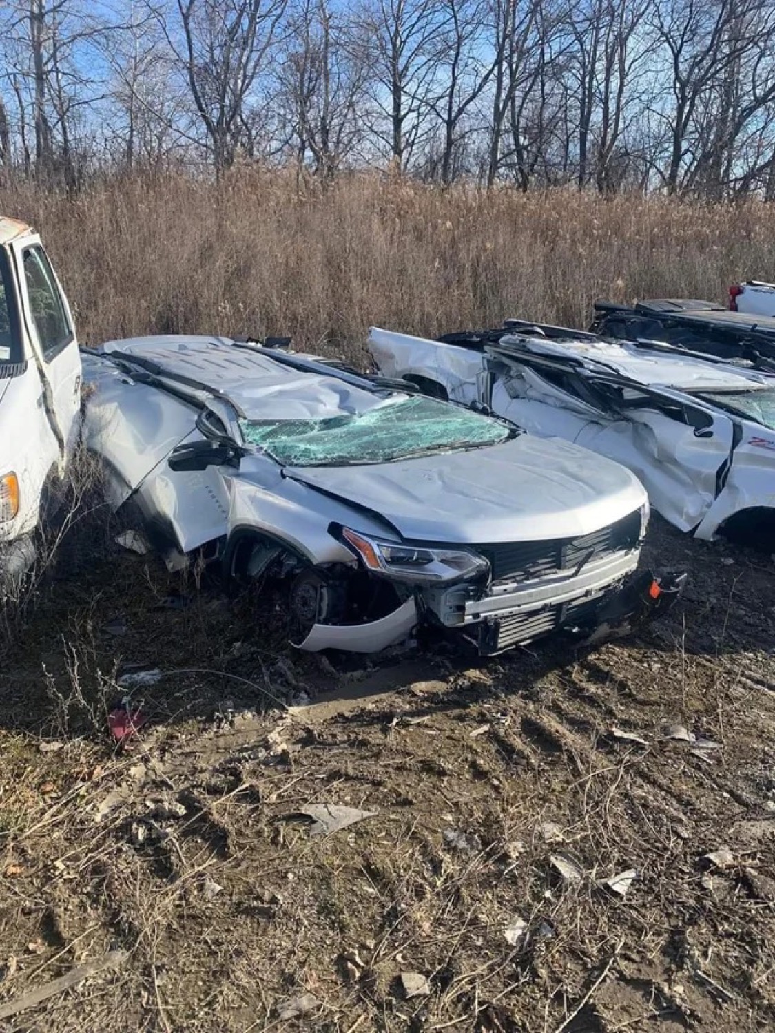 Someone Spotted These Crushed New GM Vehicles In A Junkyard