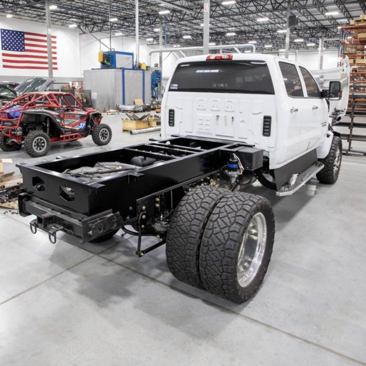 A Chevy Silverado MD with a bed frame rail extension kit.