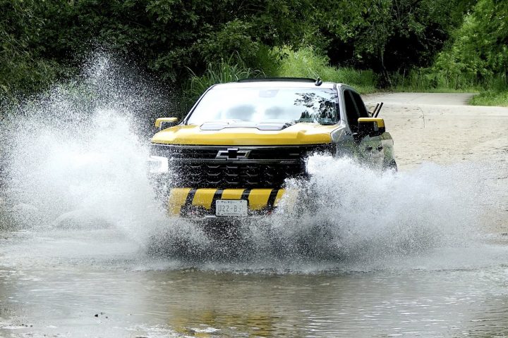 GM filed a patent for a road flooding detection system. Shown here is a Chevy pickup crossing a stream.