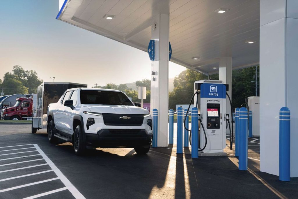 The Chevy Silverado EV charging at a GM Energy charger.