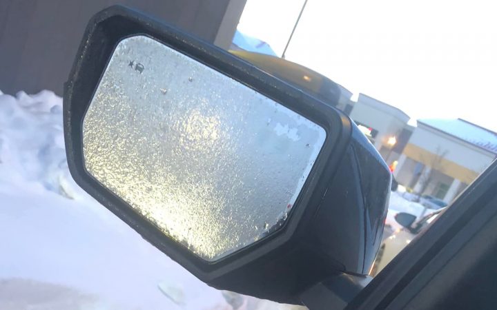 An iced-out sideview mirror. The GMC Canyon is not standard with heated mirrors.