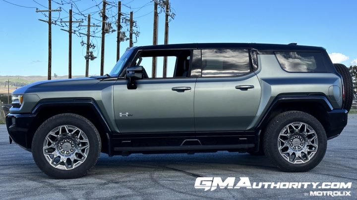 A side photo showing the GMC Hummer EV SUV in Regular Mode.