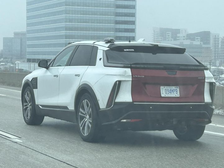 A Cadillac Lyriq prototype with possible autonomous vehicle technology sensors.