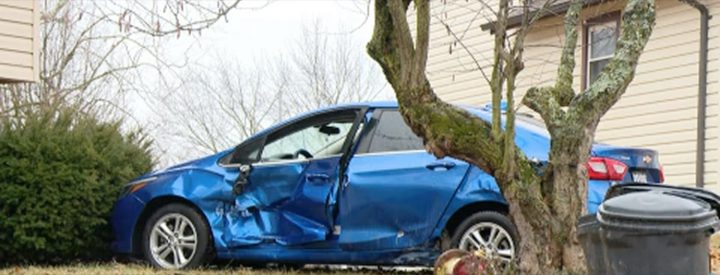 A Chevy Cruze is demolished after crashing.