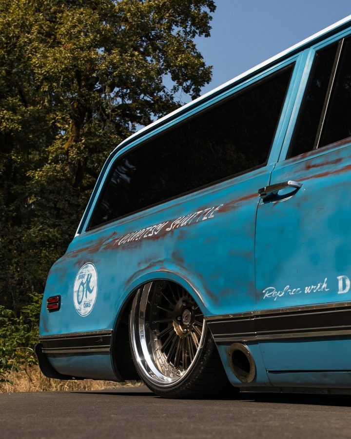 A custom GMC Suburban on air suspension.