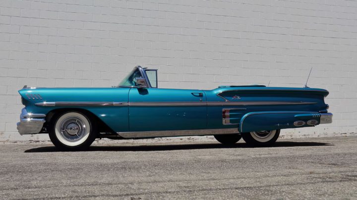 Side profile of the 1958 Chevy Impala Convertible heading to auction.