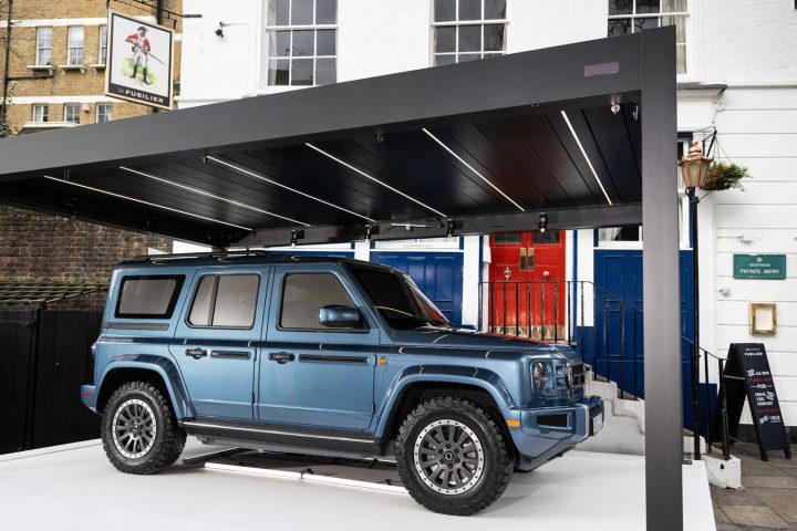 The all-electric Ineos Fusilier parked under a roof.