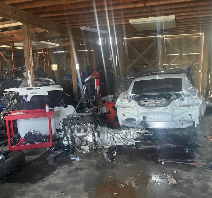 Components from a Chevy Camaro are prepped for sale on the black market.