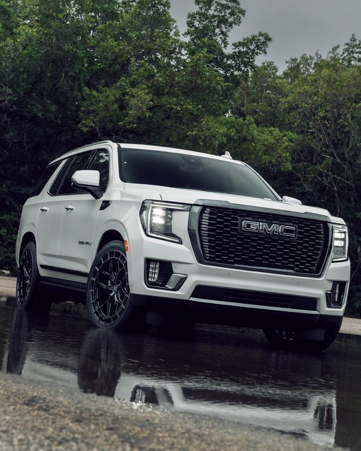 A GMC Yukon Denali Ultimate riding on aftermarket wheels.