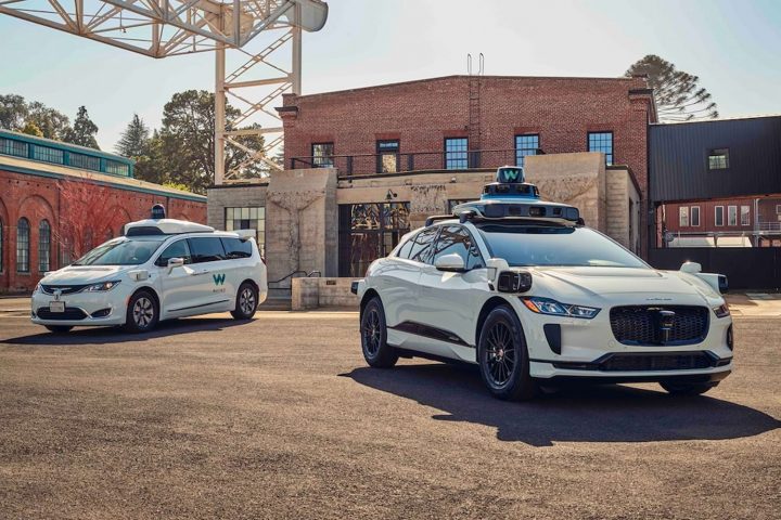 Photo of two Waymo robotaxi units.