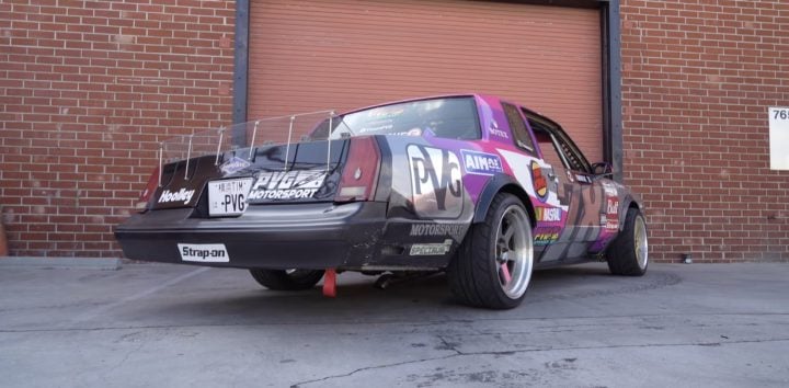 The rear end of a 1986 Chevy Monte Carlo upgraded for drifting.