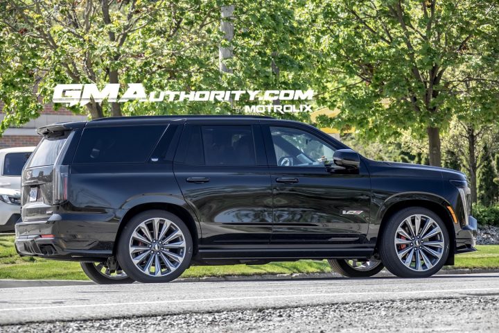 Side rear three-quarters view of 2025 Cadillac Escalade-V. Cadillac Escalade deals in March 2025 include $4,000 Loyalty Cash.
