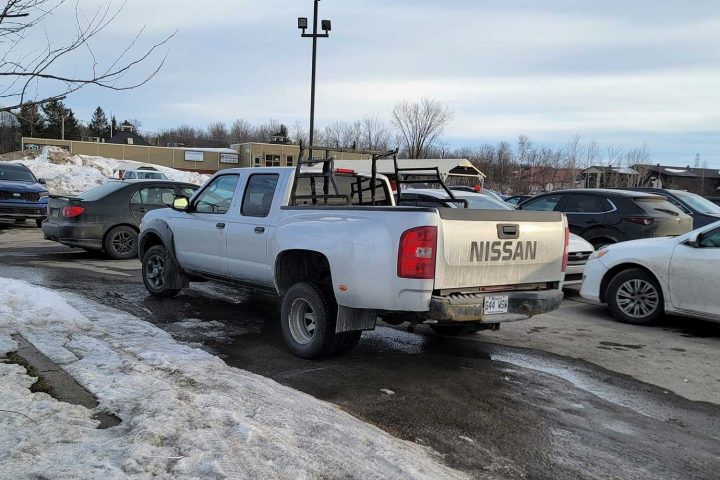 A Nissan Frontier with a Chevy Silverado HD box.