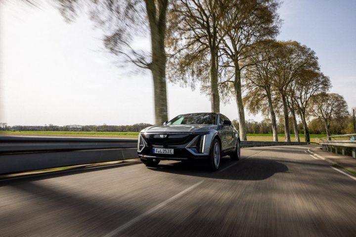 Cadillac Lyriq driving down a road in Germany.