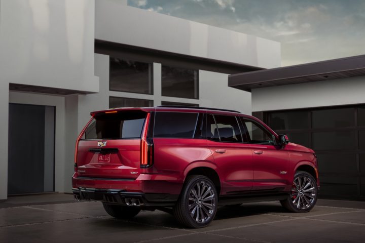 Rear three-quarters view of 2025 Cadillac Escalade-V. Cadillac Escalade deals in December 2024 include a $4,000 loyalty incentive.