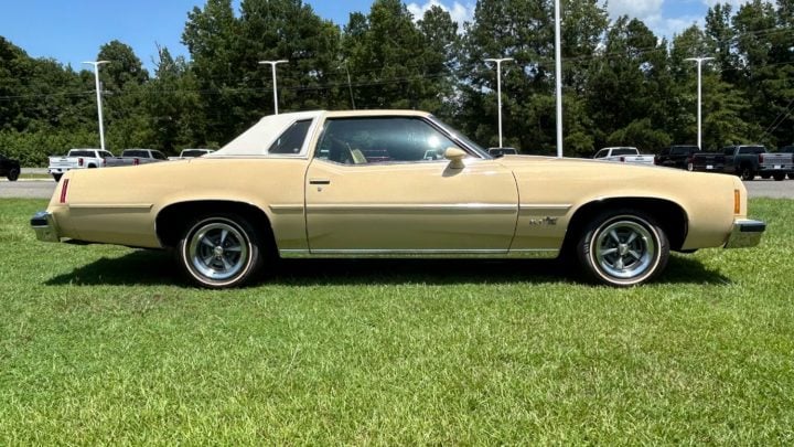 Side profile view of the 1977 Pontiac Grand Prix SJ heading to auction.