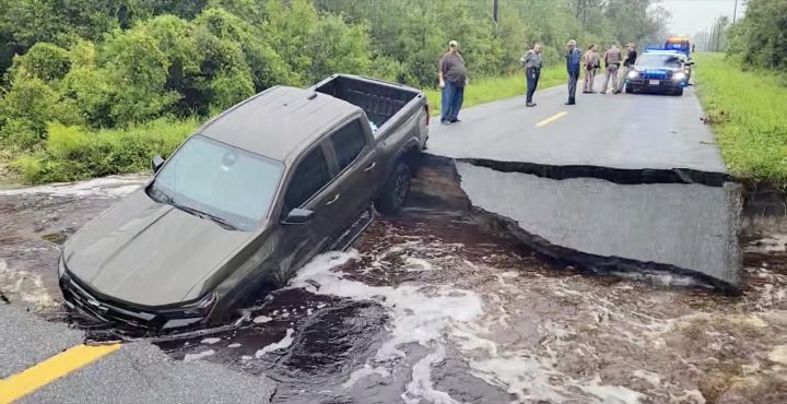 A Chevy Colorado claimed by a washed-out road in Florida.