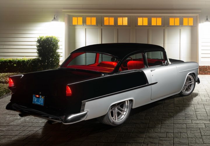 The rear three-quarters view of a 1955 Chevy Bel Air pro touring build.